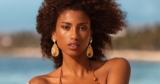 Imaan Hammam Wows in Estée Lauder Bronze Goddess Fragrance Ad